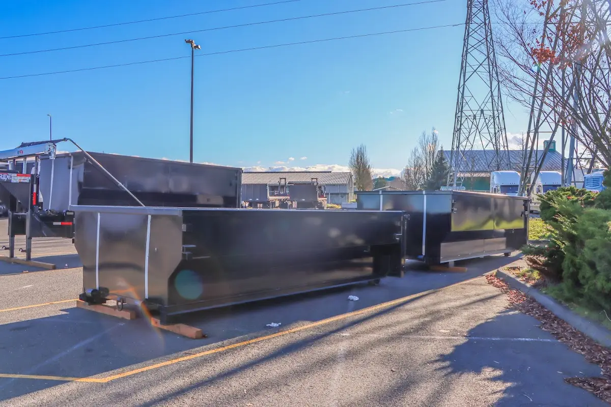 Roll-off dumpster ready for waste disposal at job site for 12 Yard Dumpster Rental in Chatham